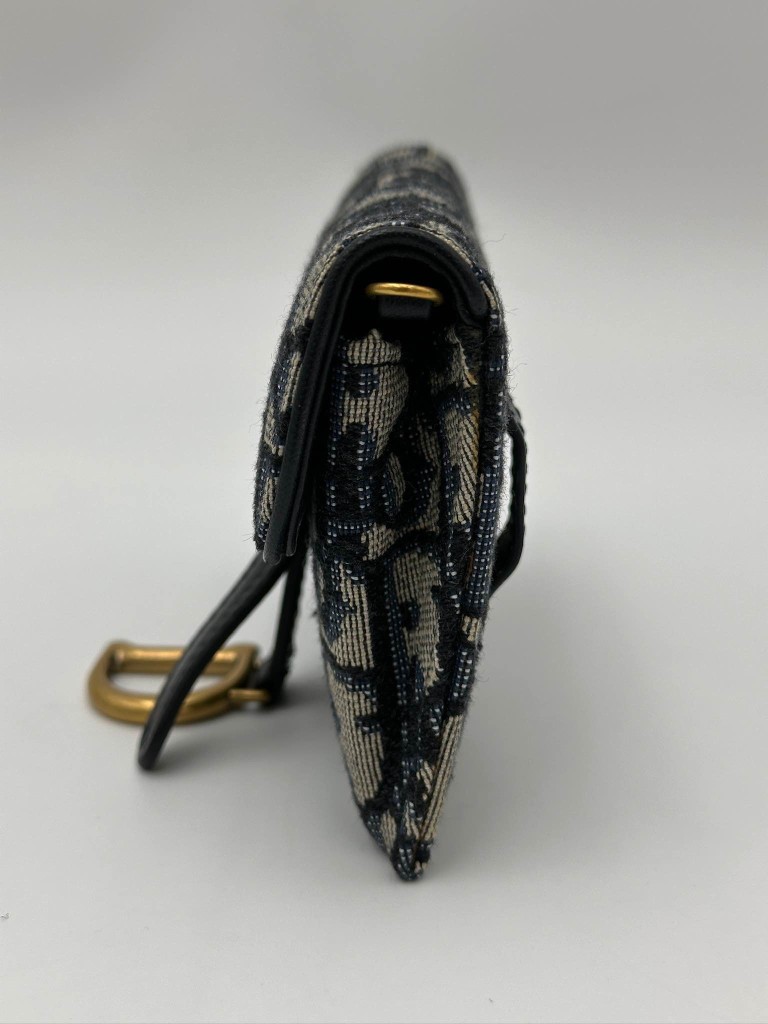 Dior wallet with a chain